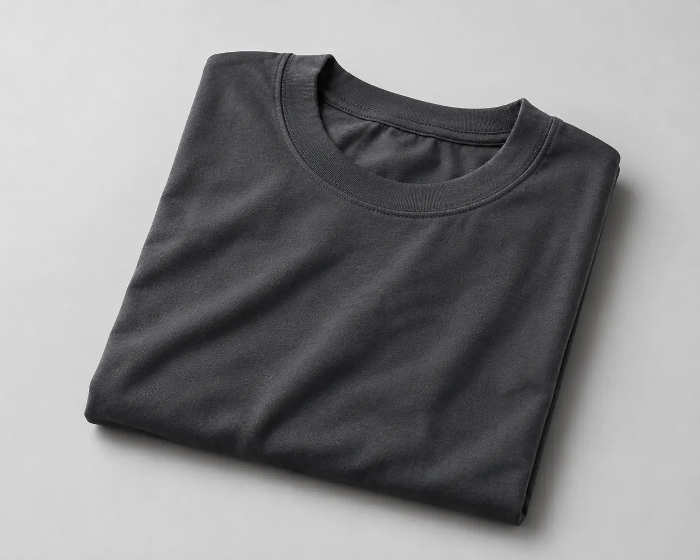 Europe 1 Heavyweight cotton crew neck T-shirt folded on a neutral background highlighting premium jersey fabric and clean garment finishing.