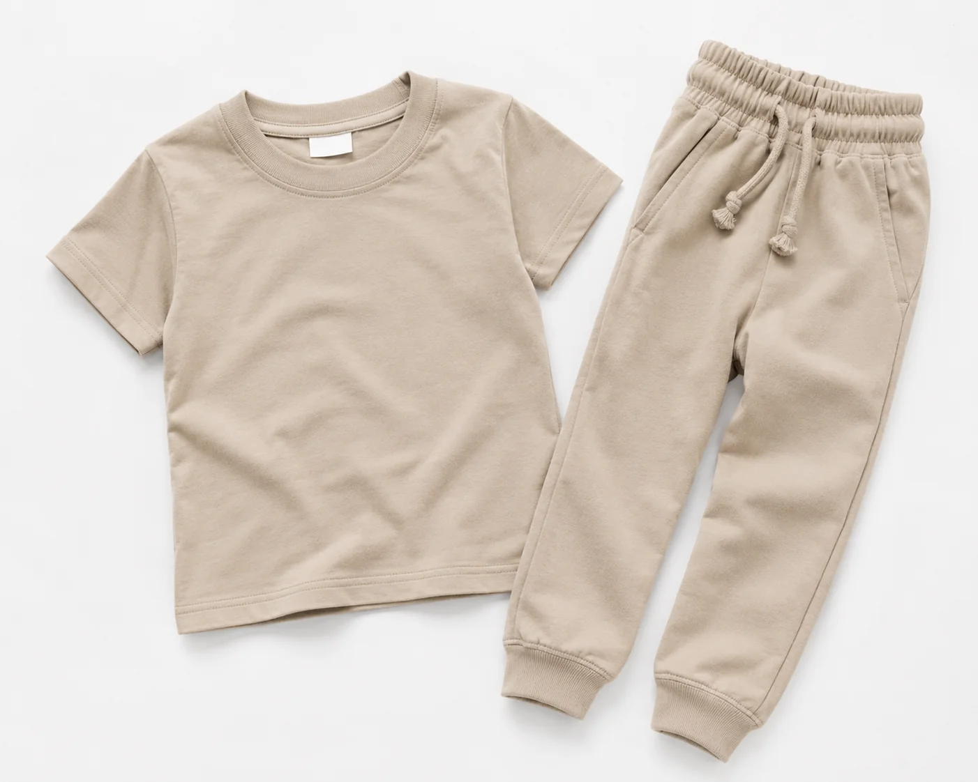 Europe 4 Export-quality children's cotton T-shirt and jogger set displayed in a clean flat lay with premium stitching and soft cotton fabric.