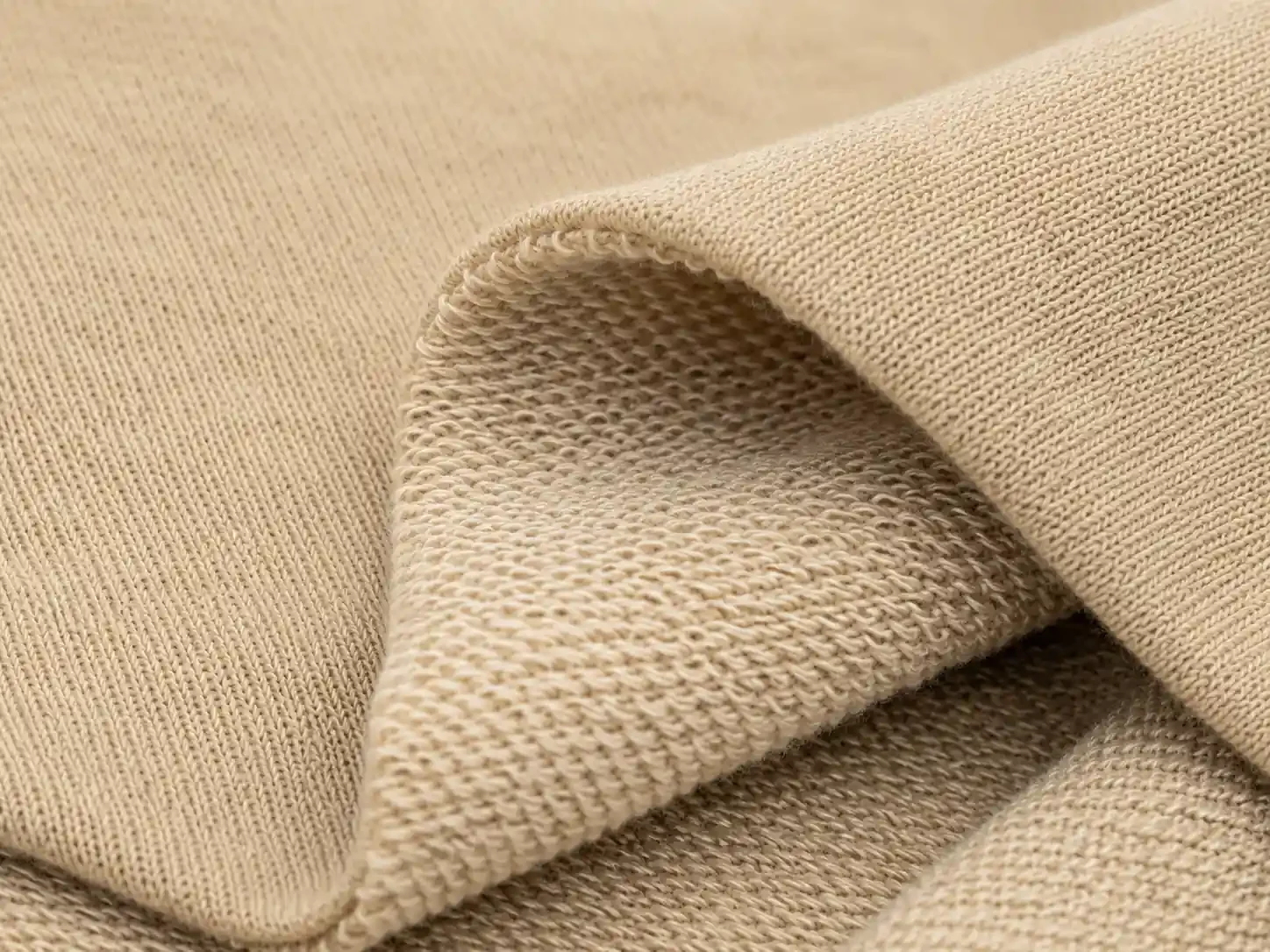 Close-up texture of loop knit unraised French terry fabric